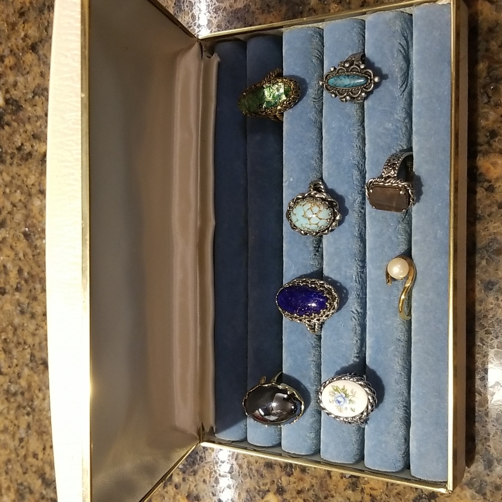 Bundle of Vintage adjustable Rings in  Ring Case.
